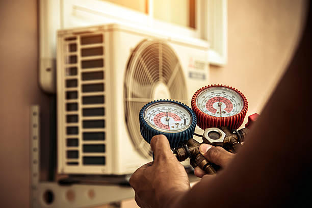 Professional Ductwork Repair technician working in Oak Hill, FL